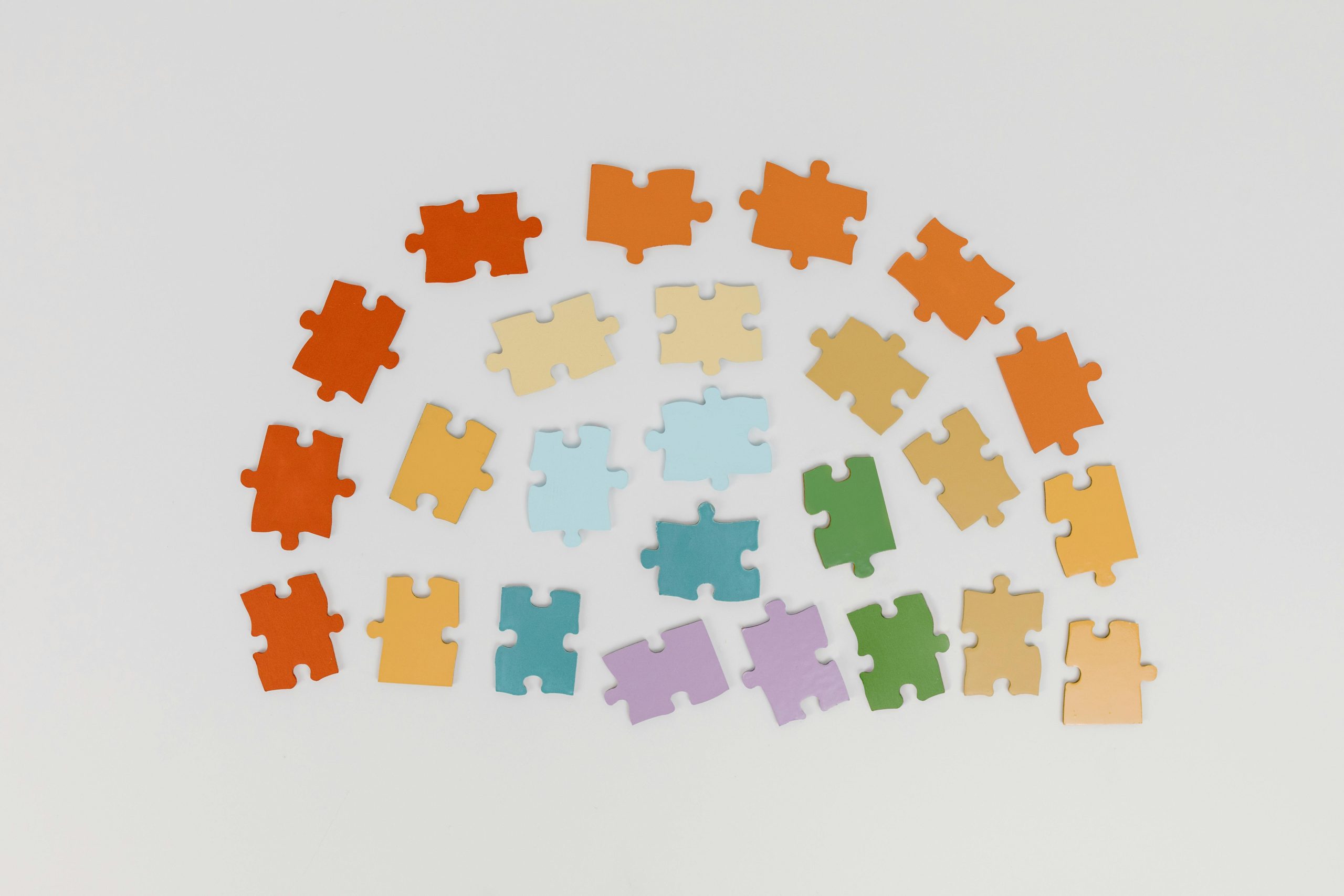 Rainbow puzzle pieces for Indianapolis Autism Services and Diagnostics